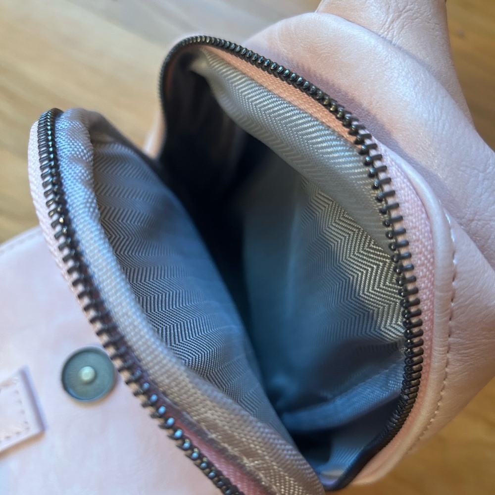 Functional cross body bag. does not have tags but has never been used. - Picture 2 of 4